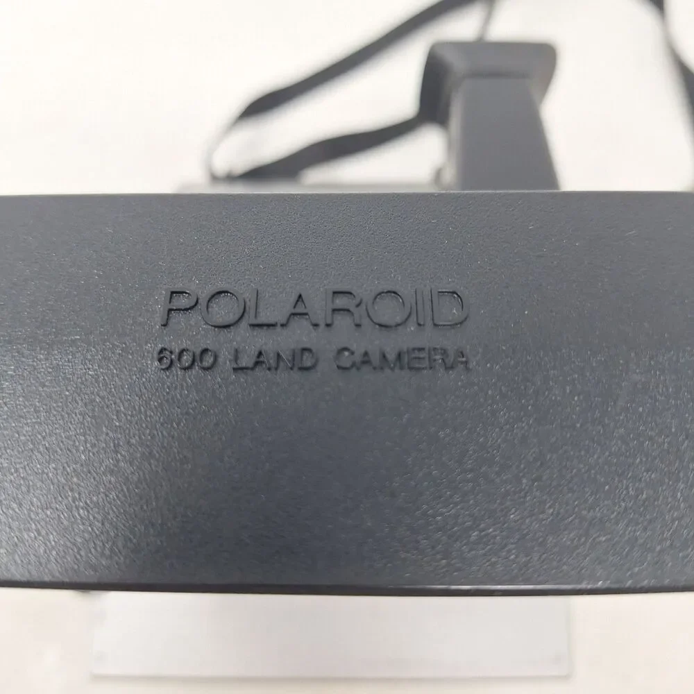 Polaroid Sun 600 Vintage Instant Film Camera Silver Black AutoFocus With Strap